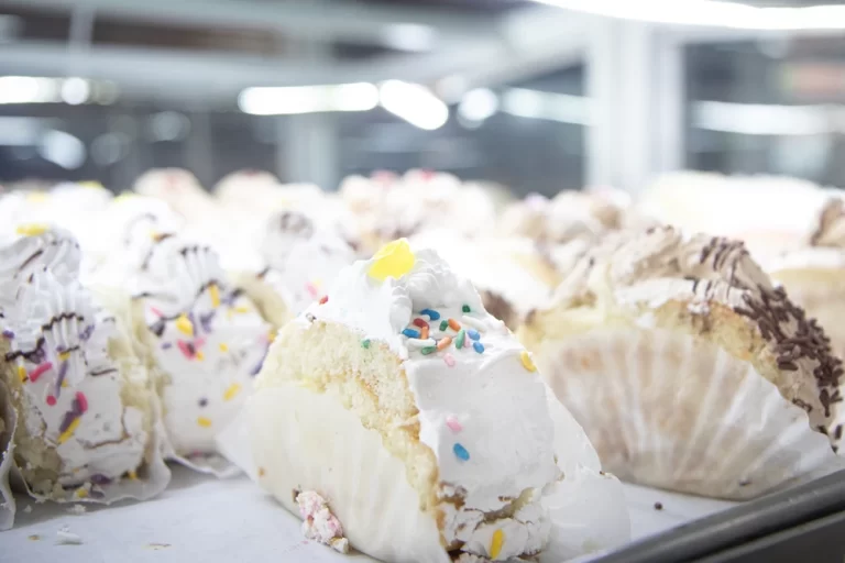 Frosted cake slices with sprinkles at Diana’s Bakery STL in St. Louis
